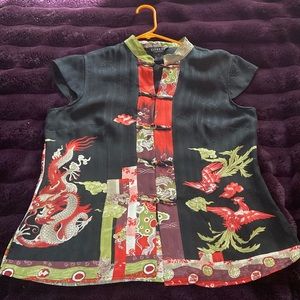 Black Capp sleeved Citron tank top. Size L but runs medium.